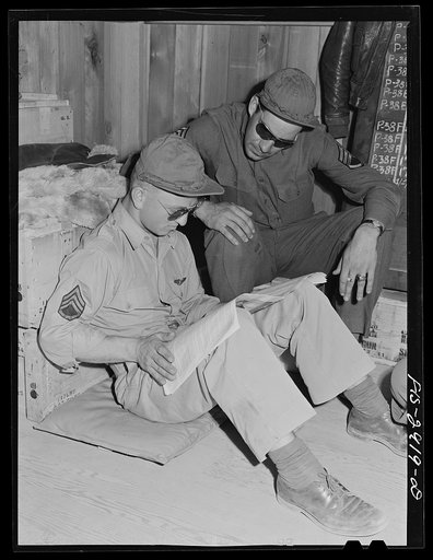 Magazines and reading matter of all kinds are definitely appreciated by the "Flying Sergeants." Lake Muroc, California