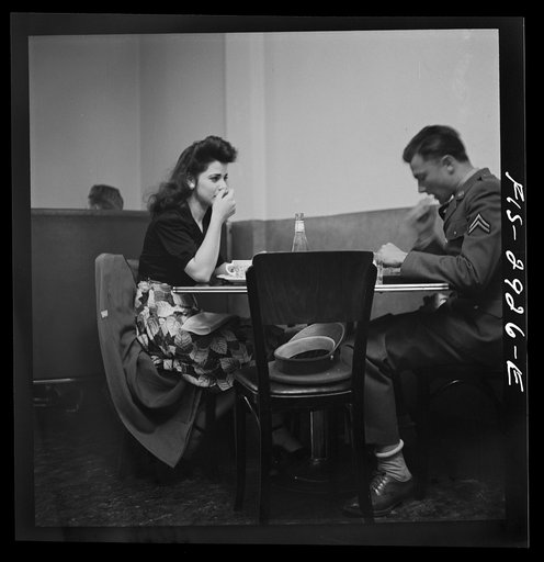 A corporal in the Army takes his girl to dinner. Bakersfield, California