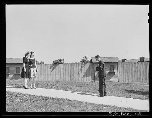 Jesse Younger taking a picture of girls on the campus. University of Nebraska. Lincoln
