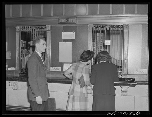 John Cockle buying a railroad ticket to Omaha for a weekend trip. University of Nebraska, Lincoln
