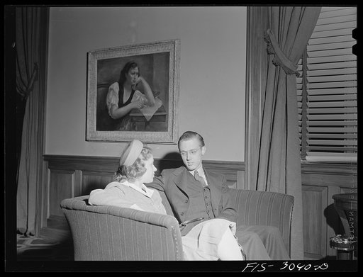 Jim Tillman and his girl in the lounge of the student union. University of Nebraska, Lincoln
