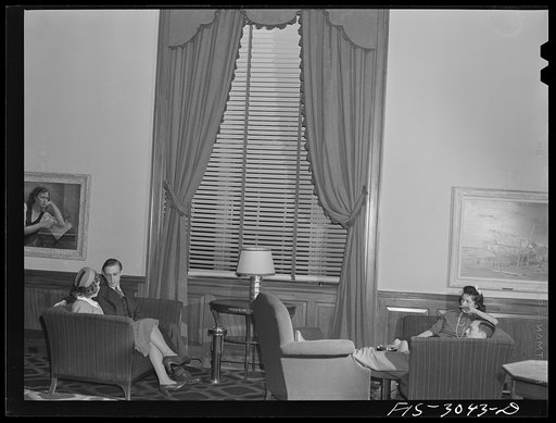 Jim Tillma and girl in lounge of the student union. University of Nebraska, Lincoln