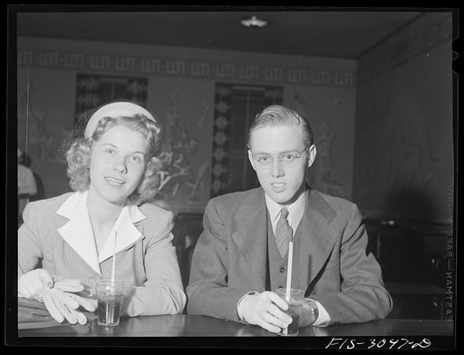 Jim Tillma and Antonette Skoda at soda fountain in student union. They will be married in June and move to Davenport, Iowa, where Jim will work for General Electric Company. University of Nebraska, Lincoln