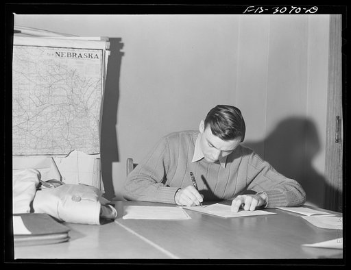 Bob Aden (center), taking an examination in economics seminar class. University of Nebraska, Lincoln