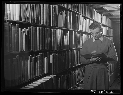 Bob Aden in the library. University of Nebraska, Lincoln