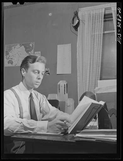 Jesse Younger, premedical student, studying in his rooming house. University of Nebraska, Lincoln