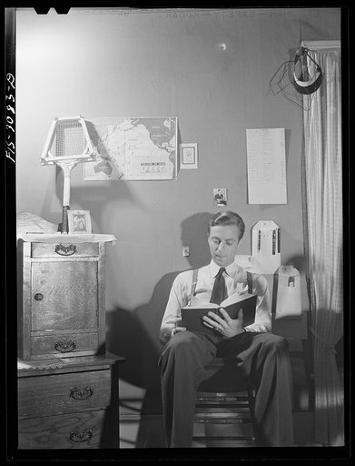 Jesse Younger, premedical student, studying in his rooming house. University of Nebraska, Lincoln