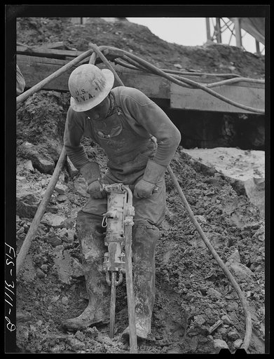 Untitled photo, possibly related to: Douglas Dam, Tennessee. Tennessee Valley Authority (TVA). Jackhammer operator