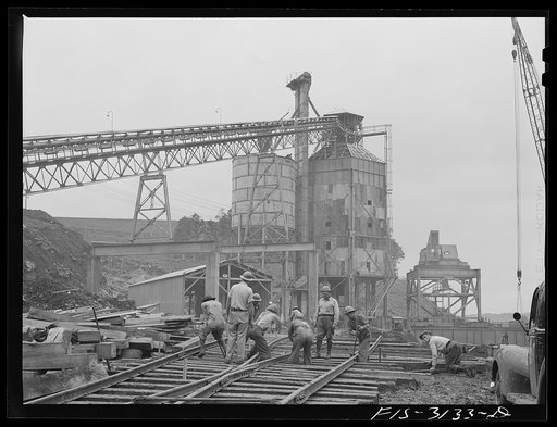 Untitled photo, possibly related to: Douglas Dam, Tennessee. Tennessee Valley Authority (TVA). Cement mixing tower and electric cranes