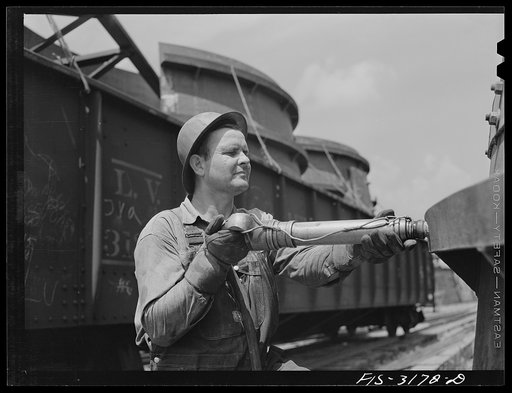 Untitled photo, possibly related to: Fort Loudon [i.e., Loudoun] Dam, Tennessee. Tennessee Valley Authority (TVA). Riveter