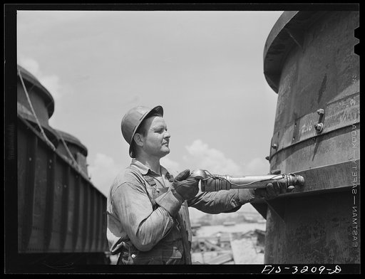 Untitled photo, possibly related to: Fort Loudon [i.e., Loudoun] Dam, Tennessee. Tennessee Valley Authority (TVA). Riveter