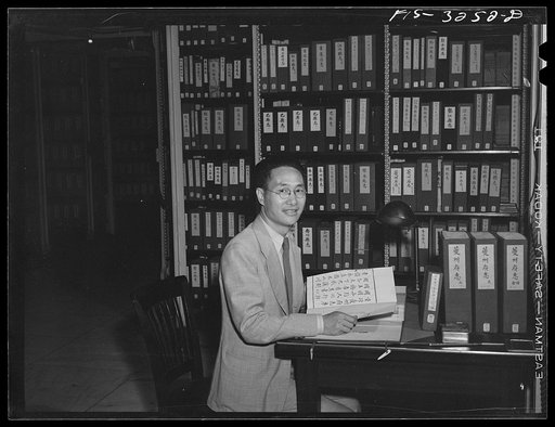 Untitled photo, possibly related to: Washington, D.C. A Chinese scholar in the Oriental Division of the Library of Congress