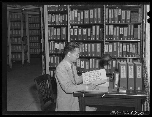 Washington, D.C. A Chinese scholar in the Oriental Division of the Library of Congress