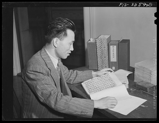 Washington, D.C. A Chinese scholar in the Oriental Division of the Library of Congress