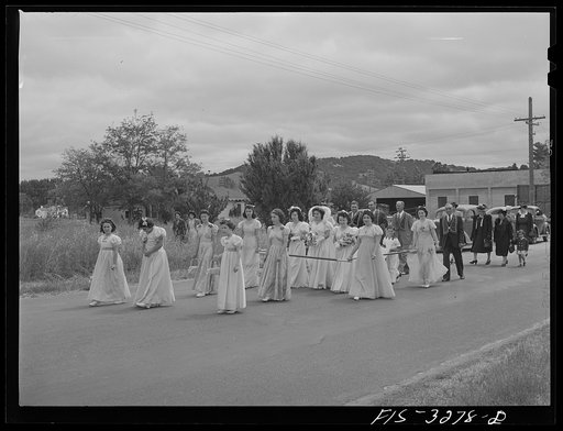 The Queen of the Holy Ghost Festival and her court as they go to church for special Mass. Novato, California