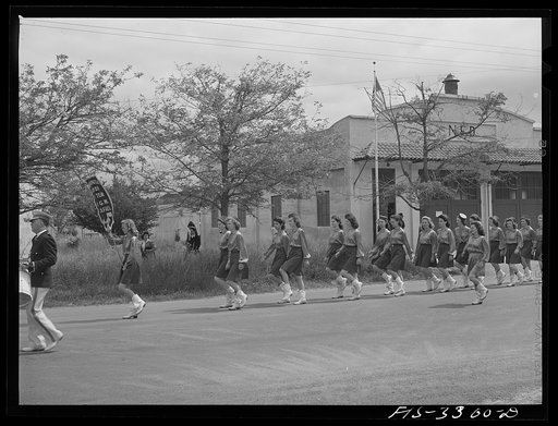 Untitled photo, possibly related to: Drill team which participated in the parade of the Holy Ghost Festival of the Portuguese-Americans at Novato, California
