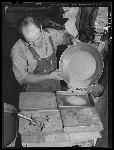 Kern County, California. Mill of the Tungsten Chief Mine. Panning partly concentrated tungsten ore
