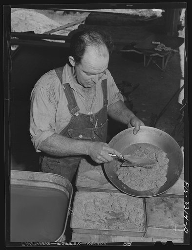 Kern County, California. Mill of the Tungsten Chief Mine. Panning partly concentrated tungsten ore