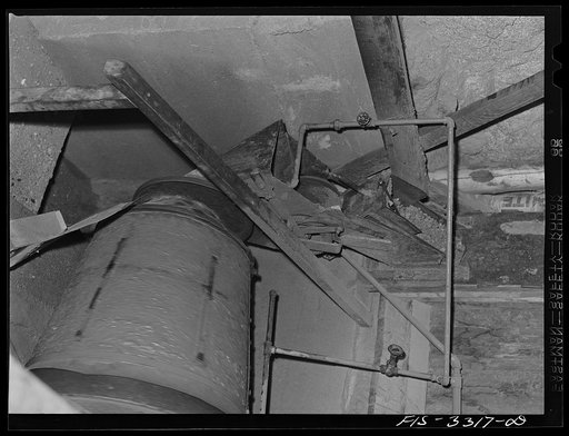 Untitled photo, possibly related to: Kern County, California. Mill of the Tungsten Chief Mine. Ball mills which grind the tungsten ore into particles suitable for the tabling concentration