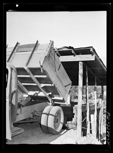 Kern County, California. Tungsten Chief Mill. Dumping tungsten ore into the hopper