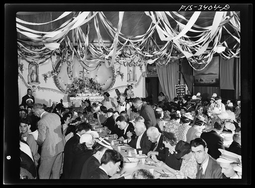 Portuguese-Americans eating dinner in the I.D.E.S.I. hall at the Festival of the Holy Ghost at Novato, California