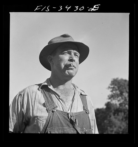 Kern County, California. One of the McKee brothers who own and operate the Tungsten Chief Mine and mill