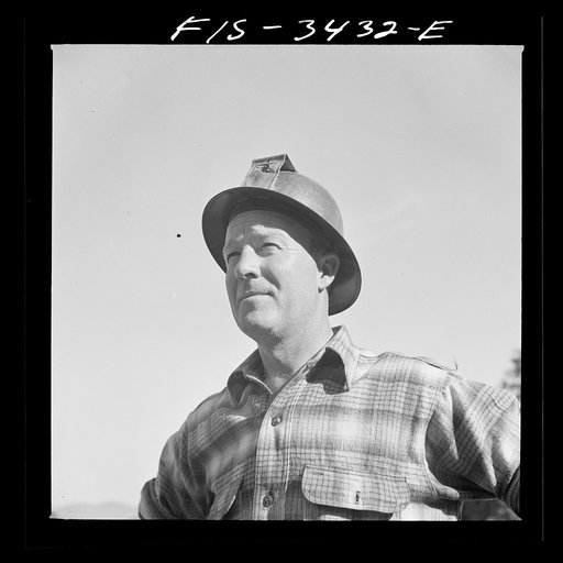Kern County, California. One of the McKee brothers who own and operate the Tungsten Chief Mine and mill