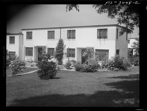 Untitled photo, possibly related to: Greenbelt, Maryland. Federal housing project. Two flat-roofed houses from the front