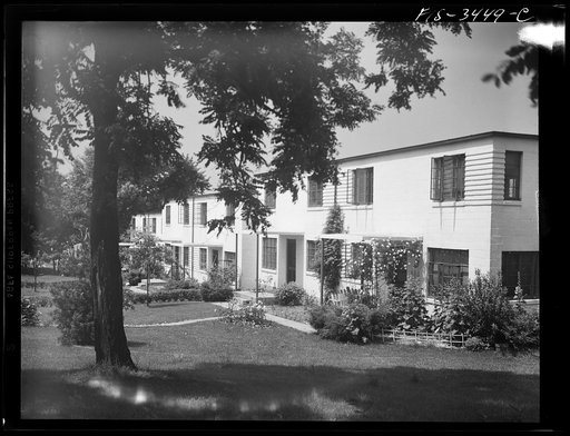 Untitled photo, possibly related to: Greenbelt, Maryland. Federal housing project. Two flat-roofed houses from the front