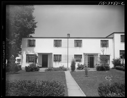 Greenbelt, Maryland. Federal housing project. Two flat-roofed houses from the front