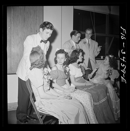 Greenbelt, Maryland. Federal housing project. Senior prom held by the high school graduating class at the time of graduation. This is conversation during an intermission