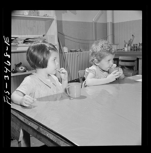 Untitled photo, possibly related to: Greenbelt, Maryland. Federal housing project. Story hour in the nursey school which is run cooperatively by the mothers. The teacher is paid twenty-five dollars a week
