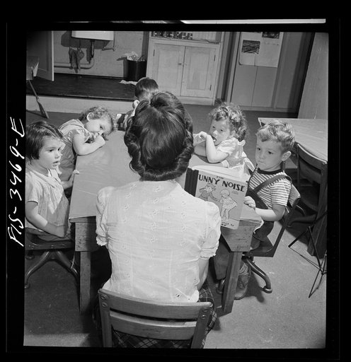 Untitled photo, possibly related to: Greenbelt, Maryland. Federal housing project. Story hour in the nursey school which is run cooperatively by the mothers. The teacher is paid twenty-five dollars a week