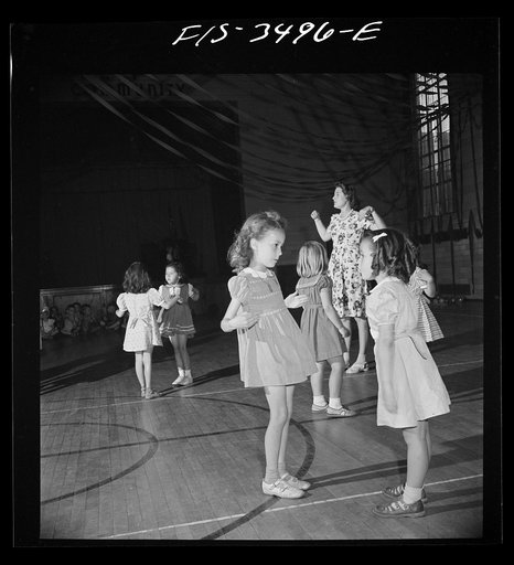 Untitled photo, possibly related to: Greenbelt, Maryland. Federal housing project. Kindergarten children practicing a balloon dance in the gymnasium for their May Day festival