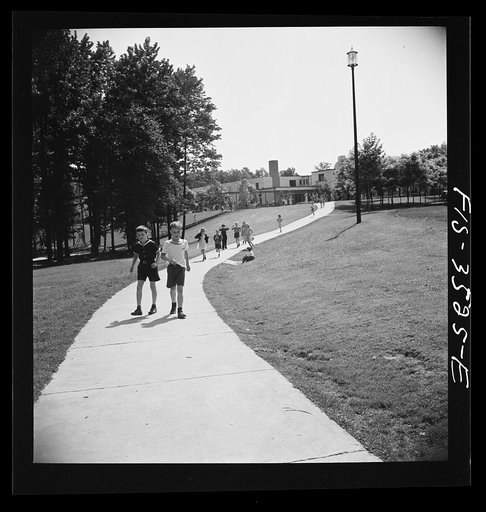 Untitled photo, possibly related to: Greenbelt, Maryland. Federal housing project. Children going home from school