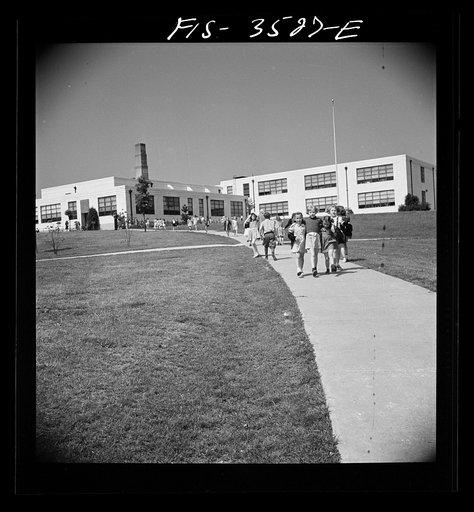 Untitled photo, possibly related to: Greenbelt, Maryland. Federal housing project. Children going home from school