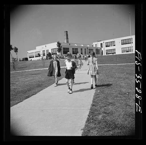 Greenbelt, Maryland. Federal housing project. Children going home from school