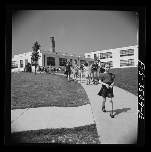 Greenbelt, Maryland. Federal housing project. Children going home from school