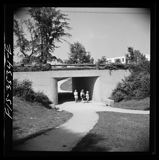 Greenbelt, Maryland. Federal housing project. Children returning home from school through an underpass