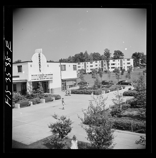 Greenbelt, Maryland. Federal housing project. View of the shopping center showing the moving picture house