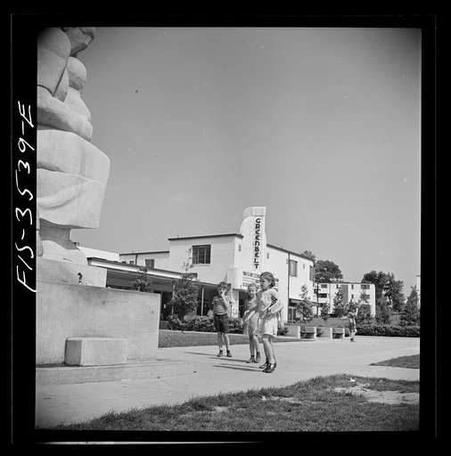 Greenbelt, Maryland. Federal housing project. Children approaching drinking fountain in the shopping center