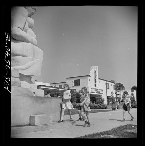 Greenbelt, Maryland. Federal housing project. Children approaching drinking fountain in the shopping center