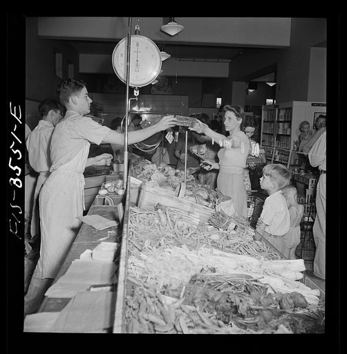 Untitled photo, possibly related to: Greenbelt, Maryland. Federal housing project. Vegetable counter in the cooperative grocery store