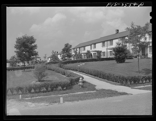 Greenbelt, Maryland. Row of gable-roofed houses and connecting paths