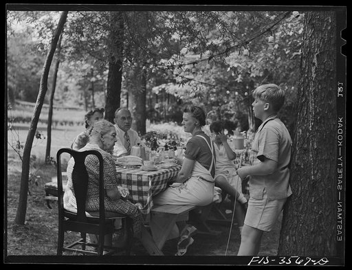 Untitled photo, possibly related to: Greenbelt, Maryland. Party for Mrs. Taylor's eighty third birthday, attended by her children and grandchildren, on the grounds of the home of her son-in-law, Dr. McCarl