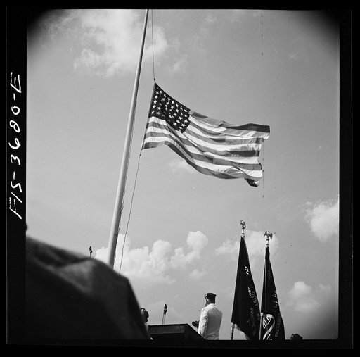 Untitled photo, possibly related to: Greenbelt, Maryland. Lowering the flag at Memorial Day ceremonies conducted by the American Legion