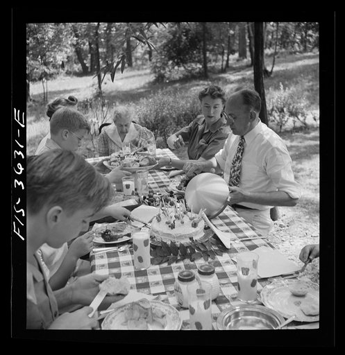 Untitled photo, possibly related to: Greenbelt, Maryland. Party for Mrs. Taylor's eighty third birthday, attended by her children and grandchildren, on the grounds of the home of her son-in-law, Dr. McCarl