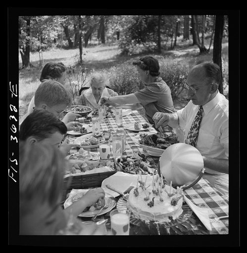 Untitled photo, possibly related to: Greenbelt, Maryland. Party for Mrs. Taylor's eighty third birthday, attended by her children and grandchildren, on the grounds of the home of her son-in-law, Dr. McCarl