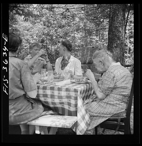 Untitled photo, possibly related to: Greenbelt, Maryland. Party for Mrs. Taylor's eighty third birthday, attended by her children and grandchildren, on the grounds of the home of her son-in-law, Dr. McCarl