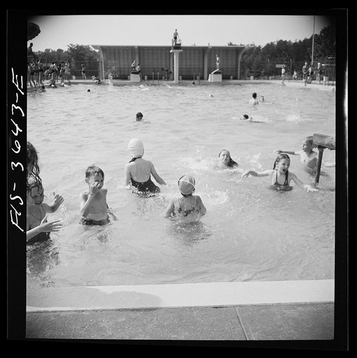 Untitled photo, possibly related to: Greenbelt, Maryland. Swimming pool. Bathers pay admittance according to age. Season tickets are obtainable by families